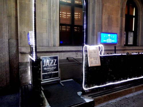 Texas Guinan's speakeasy, Club Intime, was located beneath 205 West 54th Street. It is now Flute Bar.